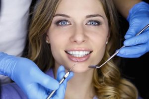 Close up of smiling woman who has undergone professional teeth whitening