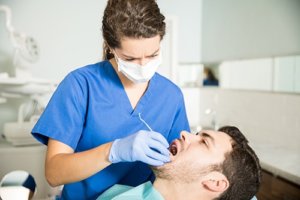 dentist check dental implants and diabetes patient
