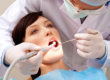 Woman receives care for her gum disease symptoms