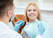 Happy patient learns how to deal with dental anxiety