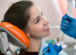 Smiling patient learns how she can relieve TMJ symptoms