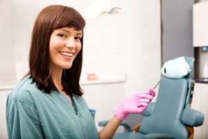 A dental hygienist at work
